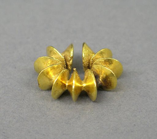 Ear Clip Composed of Fused Discs