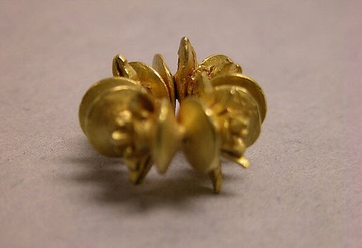 Ear Clip Composed of Fused Discs