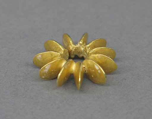 Ear Clip Composed of Fused Discs