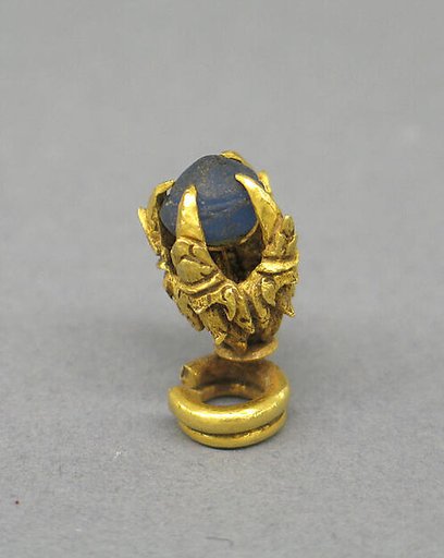 Ear Clip with Light Blue Stone in Four Prong Setting