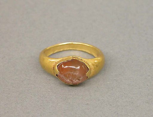 Ring with Inset of Opal Colored Stone