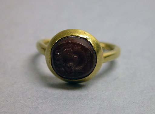 Ring with Inset Circular Red Stone