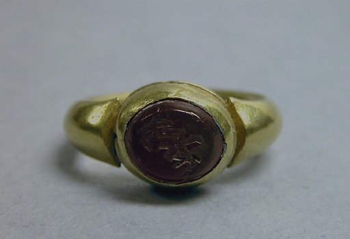 Ring with Inset Oval-Shaped Stone