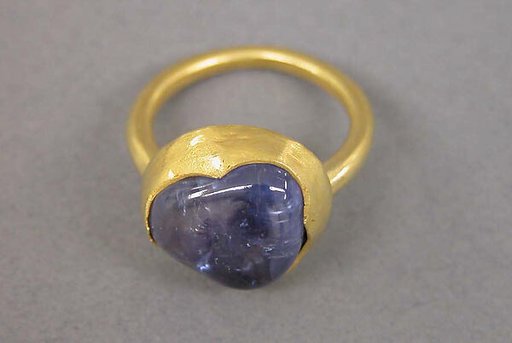 Ring with Inset Blue Stone in Circular Mount