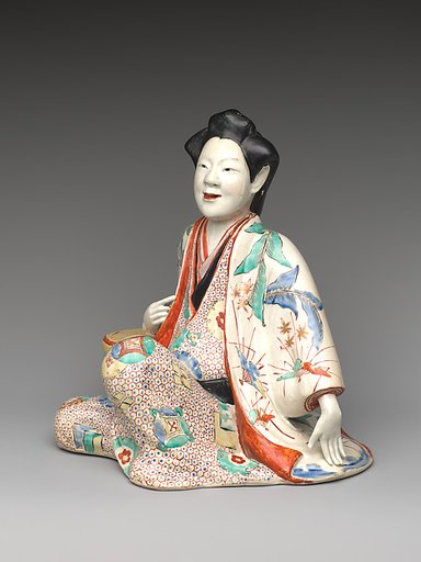 Figure of a Seated Beauty