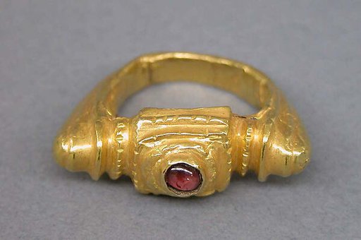 Ring with Reddish-purple Stone Set in Square Bezel