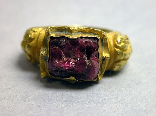 Stirrup-shaped Ring with Purple Stone