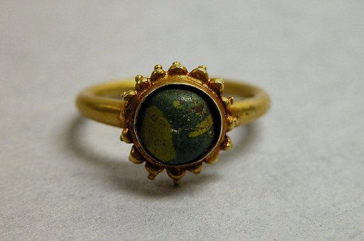 Ring with Green Stone in Circular Mount