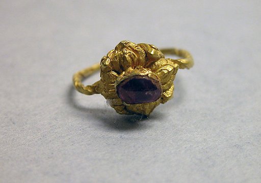 Ring with Purplse Stone set in Lotus Mount