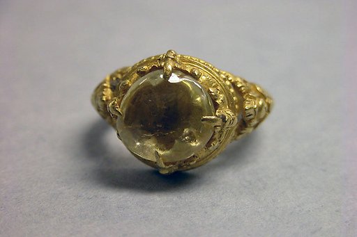 Ring with Yellow Stone and Ornamented with Foliate Forms