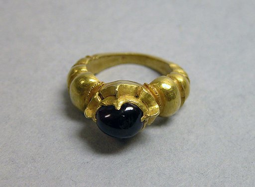Ring with Reddish-purple Stone and Ribbed Hoop