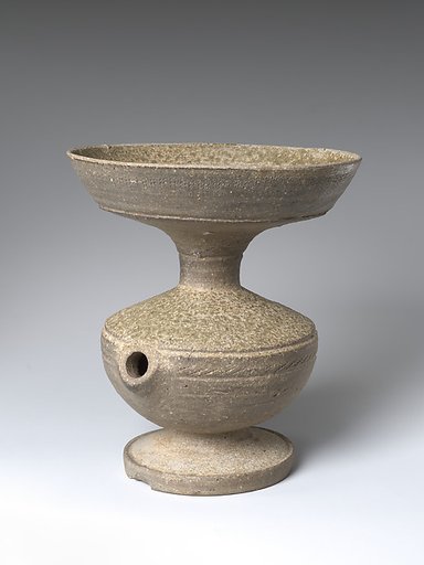 Vessel with Straw Hole