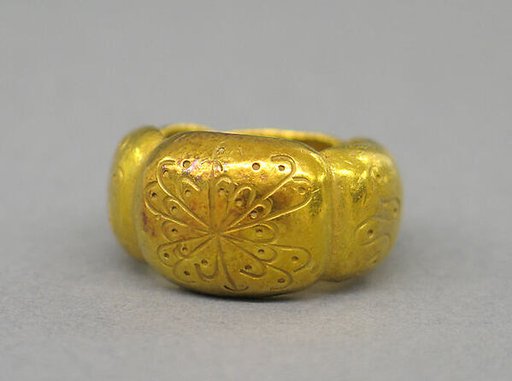 Ring Consisting of Lobed Sections with Incised Designs