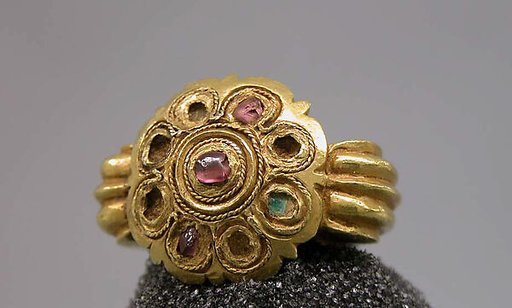 Stirrup-Shaped Ring with Stones Set in Circular Bezel