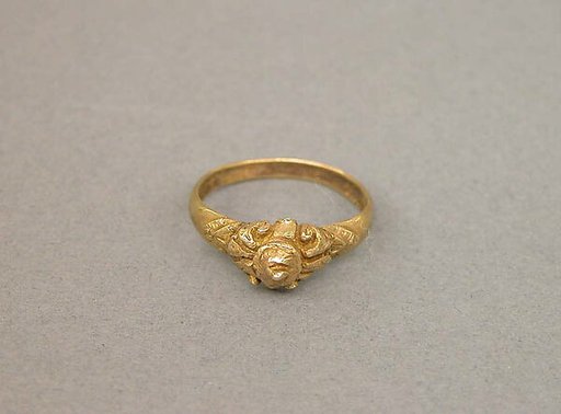 Ring with Raised Conical Motif