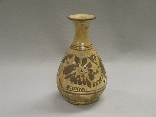 Bottle with stylized flowers