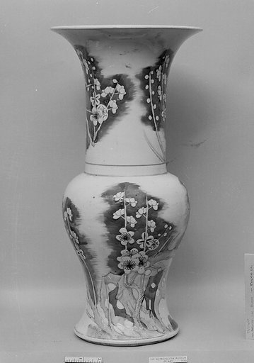 Vase decorated with blossoming plum
