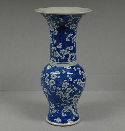 Vase decorated with blossoming plum