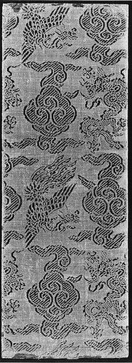 Sutra cover with dragons and phoenixes amid clouds