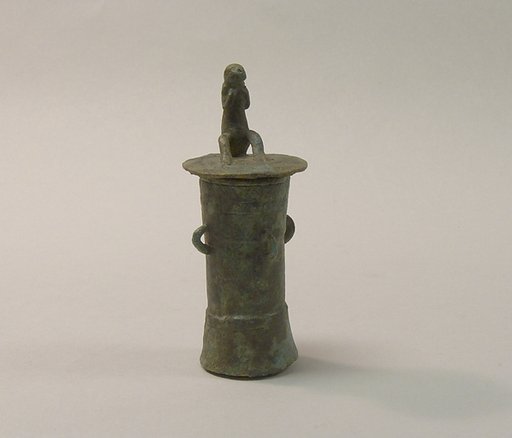 Lime Container in the Form of a "Mloko" Drum Surmounted by a Crouching Figure
