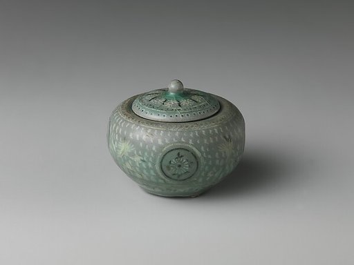 Small jar and cover decorated with chrysanthemums, cranes, and clouds