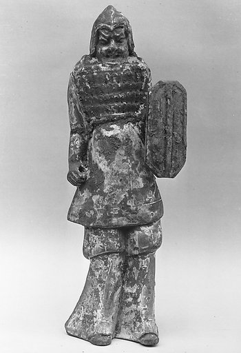 Armored warrior with shield