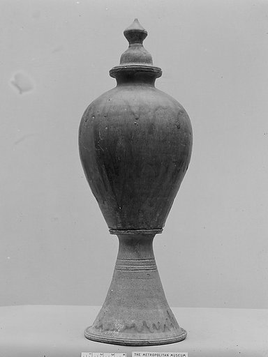 Covered jar on stand