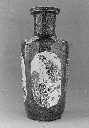 Vase decorated with flowers and butterflies