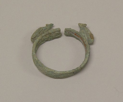 Wide Bracelet with Facing Animals(?)
