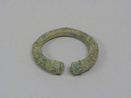 Open Solid Bangle with Applied End Decorations