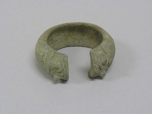 One From a Pair of Bracelets with Wide Open Ends
