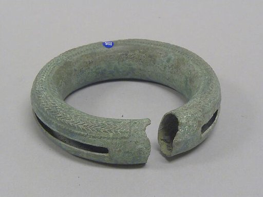 Hollow Bangle with Pellets and Decoration