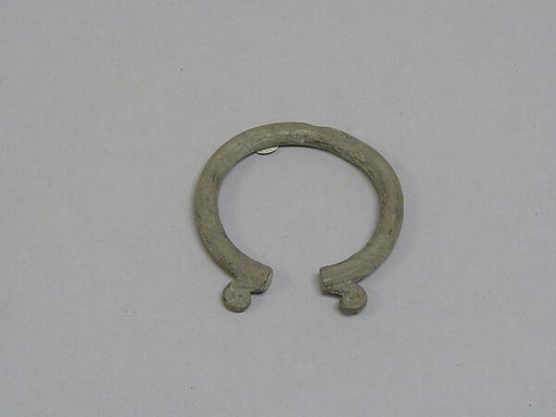 Solid Open Bangle with Attached Scrolls at Ends