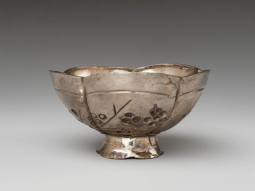 Cup with flowering plum and crescent moon