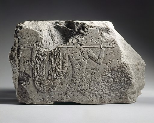 Relief fragment with soldiers running with a rope