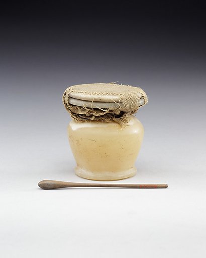 Kohl Jar with the Lid Tied in Place and Kohl Stick