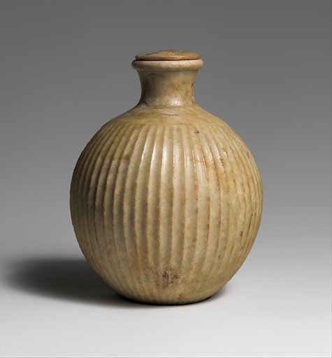 Fluted bottle with lid
