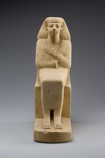 Statue of a Seated Man in a Cloak