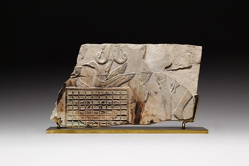 Birds in a cage and offering bearers