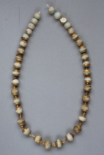 Globular Beads with Caps, Strung as a Necklace
