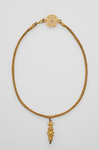Loop-in-loop chain with intricate openwork medallion at the clasp and a gold Bes pendant