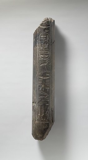 Fragment of a Statue of Haremhab bearing a standard