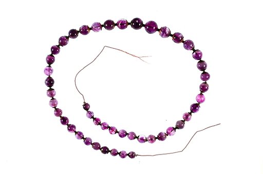String of 46 round beads in graded sizes