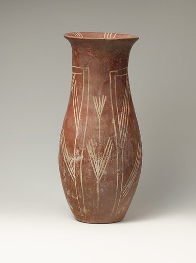 White cross-lined ware vase with plant designs