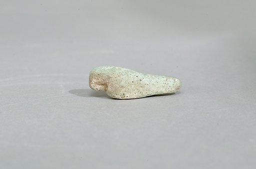Figurine of a crouching falcon