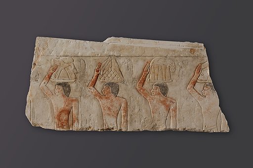 Relief Fragment depicting offering bearers from the mastaba of Idut, daughter of King Unis (?)