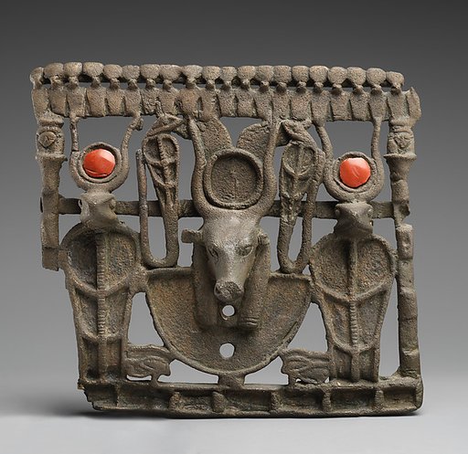 Pectoral with bovine head crowned with disk, horns and feathers