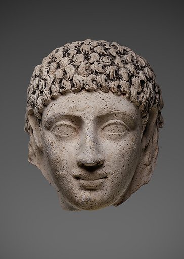 Mask of a young person with an unusual hairstyle