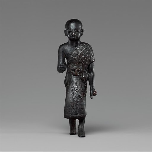 Priest in a leopard skin cloak with an inscription and Osiris on his skirt