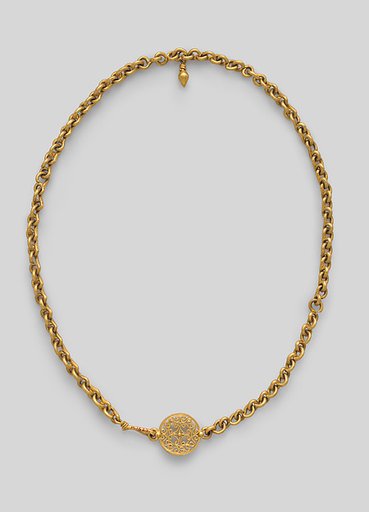 Necklace with ornate clasp ornament and a small drop pendant